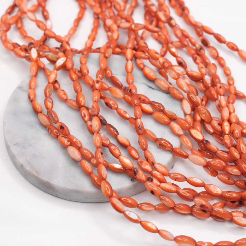 Shell beads/ orange olives approx. 5x10mm/ string 38cm MU139E