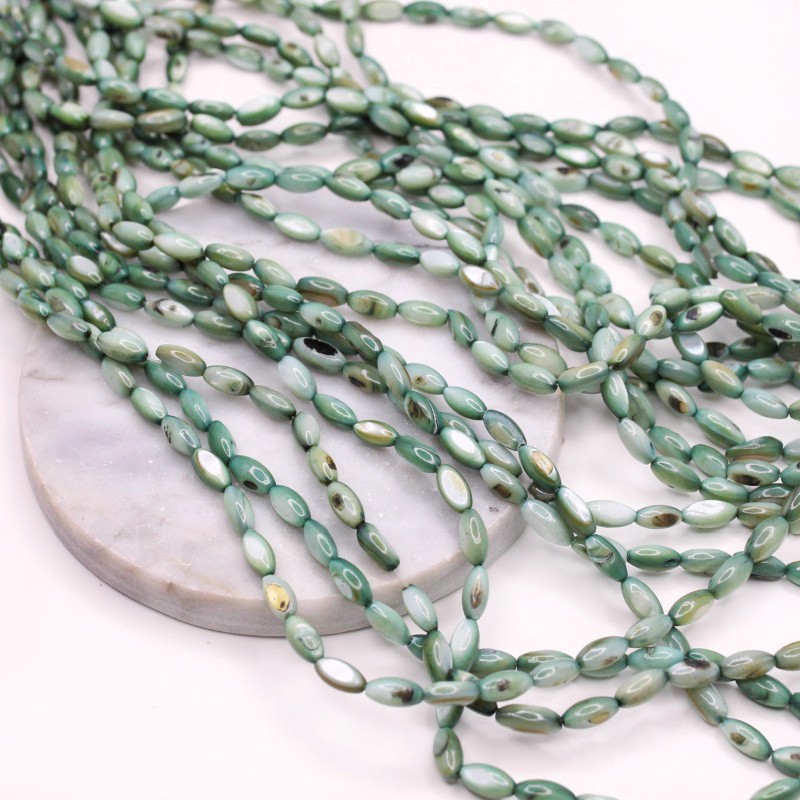 Shell beads/ dark green olives approx. 5x10mm/ string 38cm MU139K