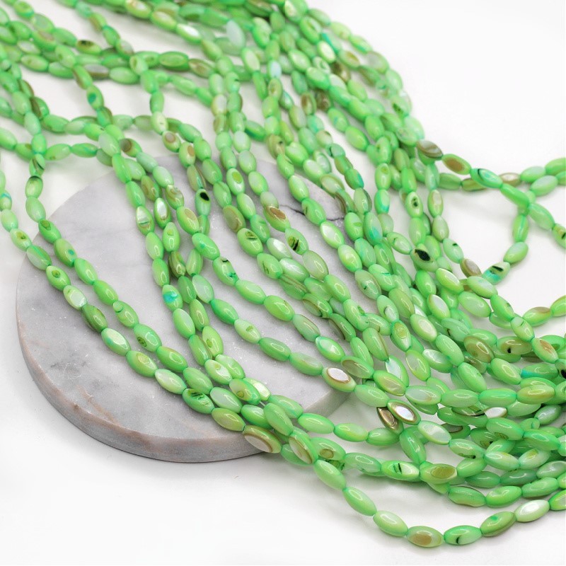 Shell beads/ bright green/ olives approx. 5x10mm/ string 38cm MU139M