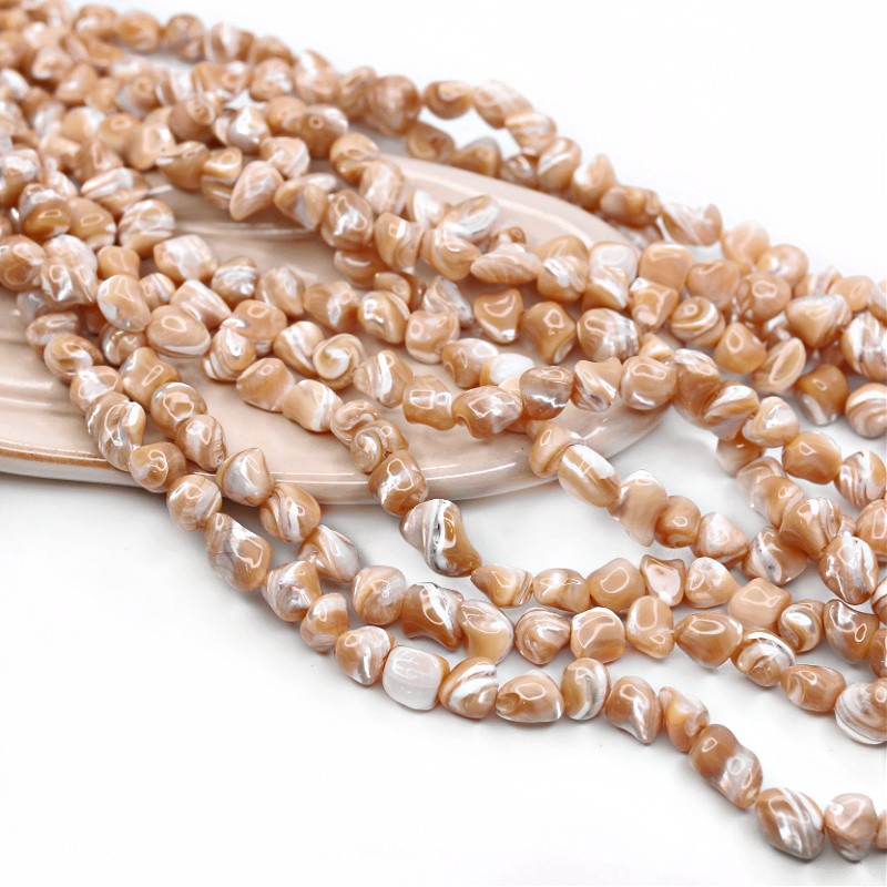 Mother of pearl beads / beige irregular approx. 9x11 mm / 41 pcs / string MU227