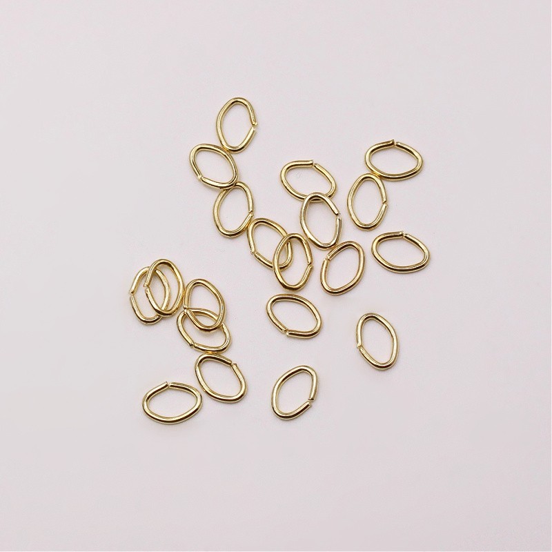 Oval gold mounting links 9x6x1mm 100pcs SMKOOW961KG