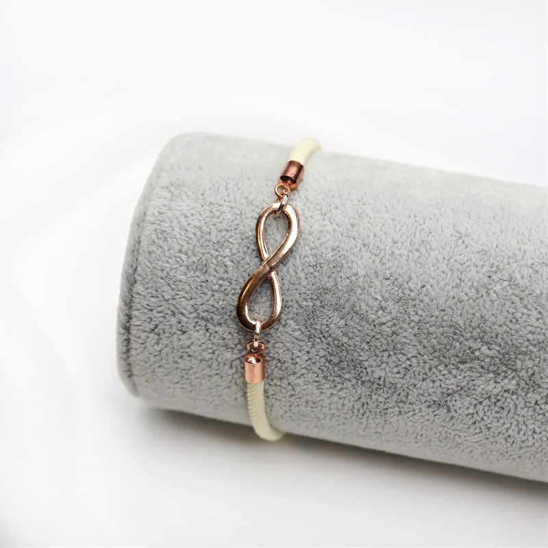 Bracelet base/ sliding clasp/ rose gold/ cream string/ approx. 12.5cm 1 pc B17