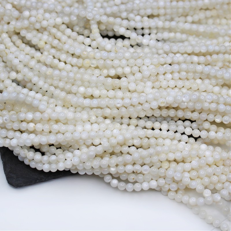 Koraliki kulki z masy perłowej/ kremowe 4mm 95szt/ sznur MUKU0401