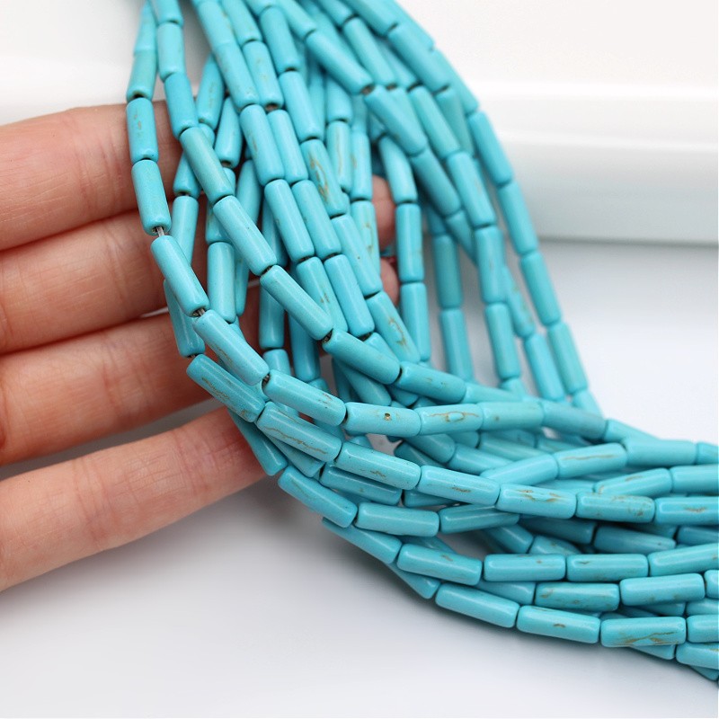 Turquoise howlit/ rollers 13x4mm 29 pcs/ cord HOTUW06