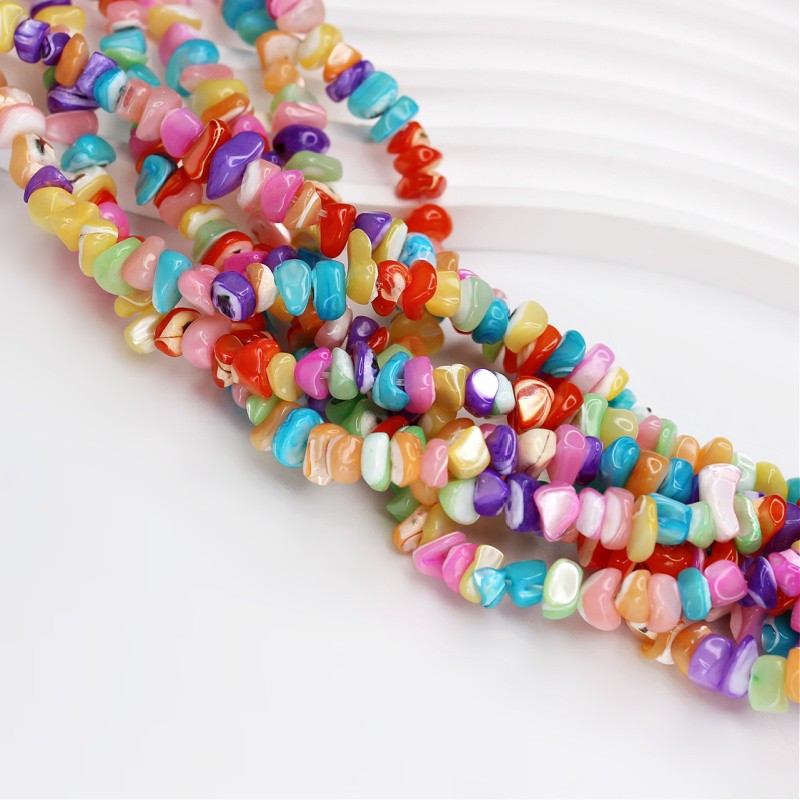 Pearl shell/mix of colors/irregular chips 7-9mm/cord 38cm MU236