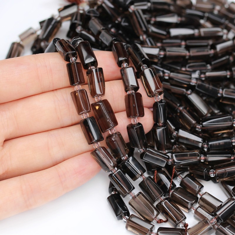 Ice obsidian/ irregular faceted rollers approx. 7x11mm/ 15 pcs/rope KAOBIWA01