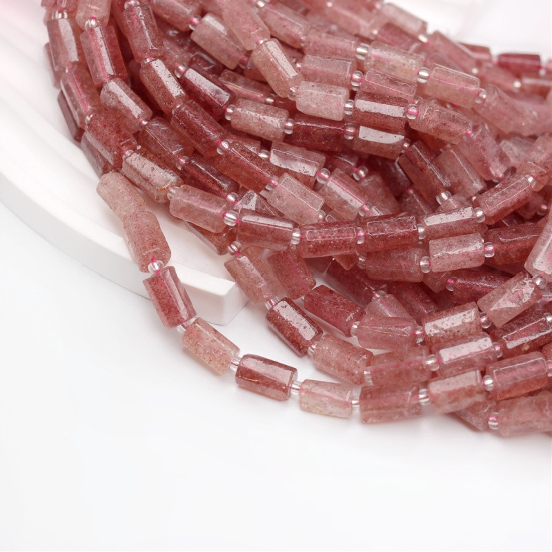 Strawberry quartz/ irregular faceted rollers approx. 7x11mm 15 pcs/ cord KAQSWA01