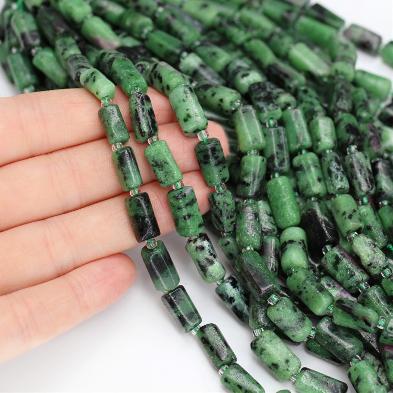 Zoisite with ruby / irregular faceted rollers approx. 7x12mm 13 pcs / rope KARZWA01
