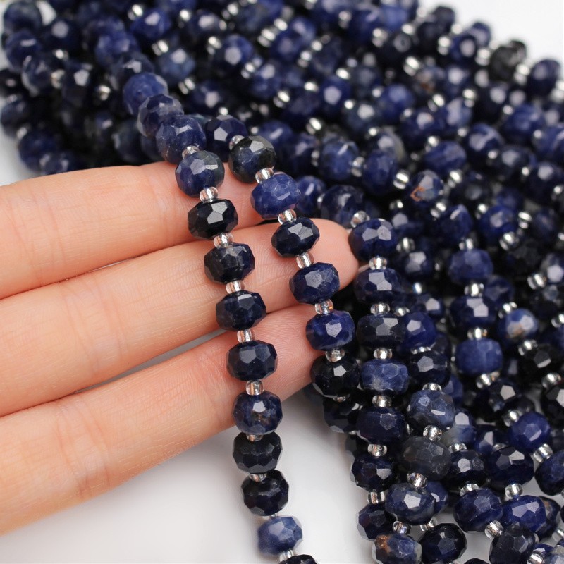Sodalite/ faceted donuts approx. 8x6mm 24 pcs/ cord KASO86