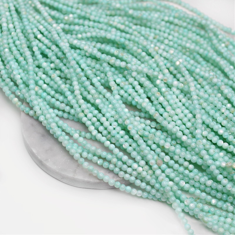 Mother of pearl beads/ aquamarine/ 4mm balls/ 38cm MUKU0418