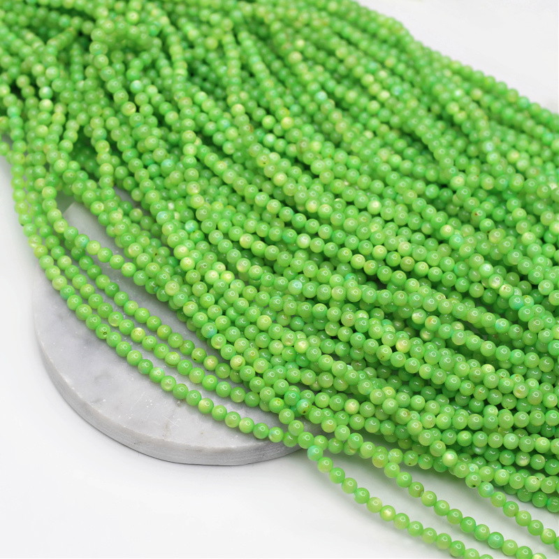 Mother of pearl beads/lime/balls 4mm/38cm MUKU0420