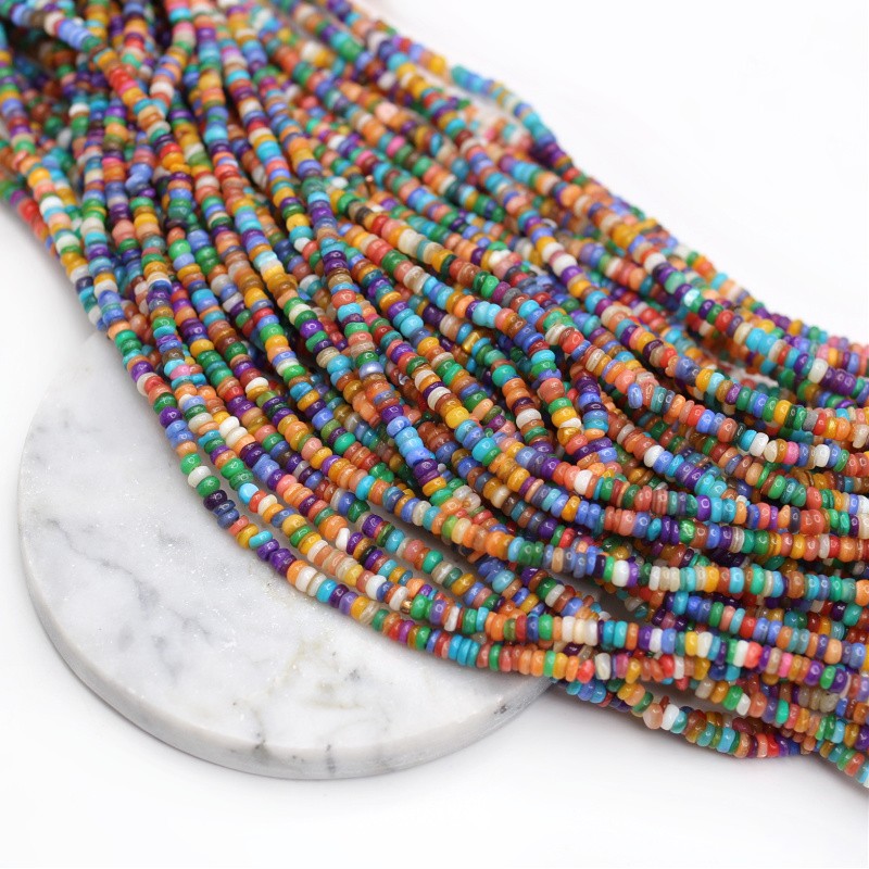 Mother of pearl beads/dark multicolor/irregular discs approx. 4mm/38cm MU232I