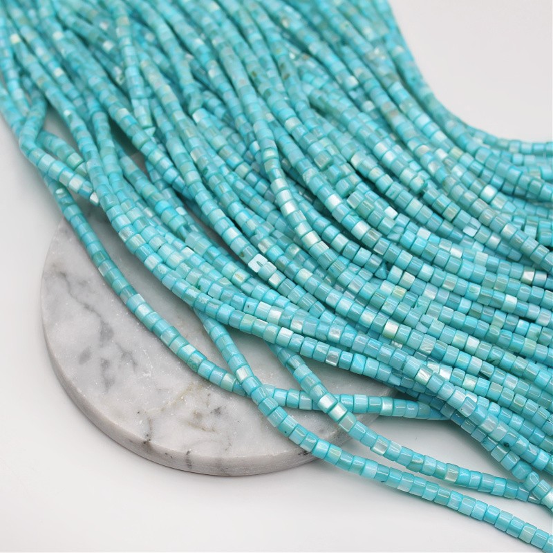 Mother of pearl beads/cyan rollers approx. 4x3mm/39cm MU233G