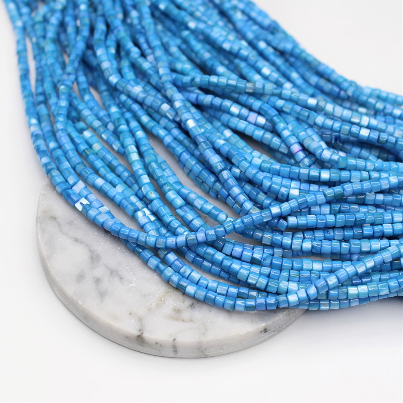 Mother of pearl beads / blue rollers approx. 4x3mm / 39cm MU233H