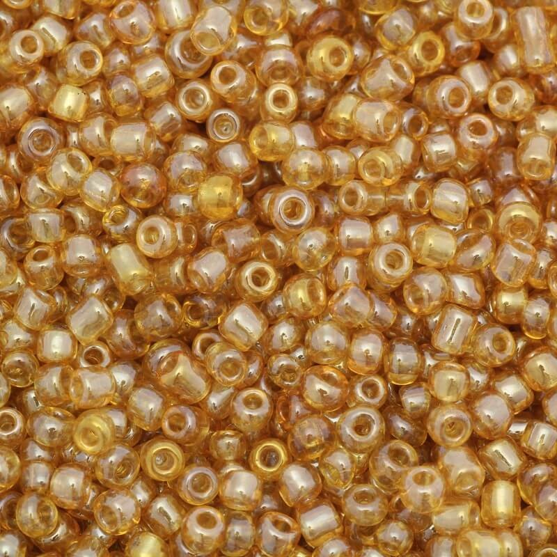 Iridescent honey beads iridescent (11/0) 2x2mm 25g SZMN22IR020