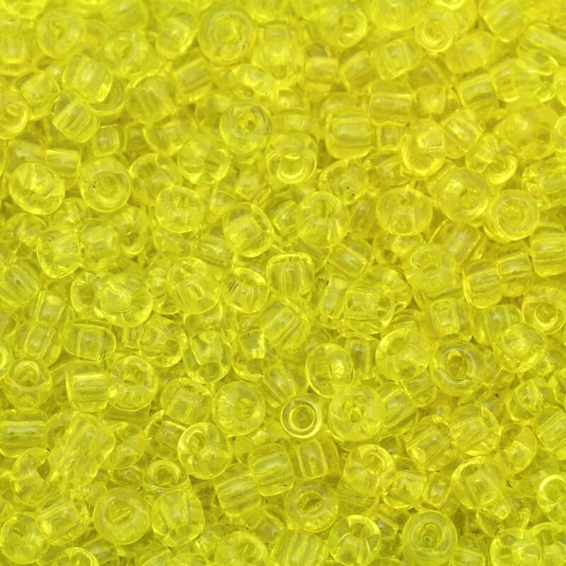 Koraliki drobne transparentne żółte (9/0) 2x3mm 25g SZMN23TR003