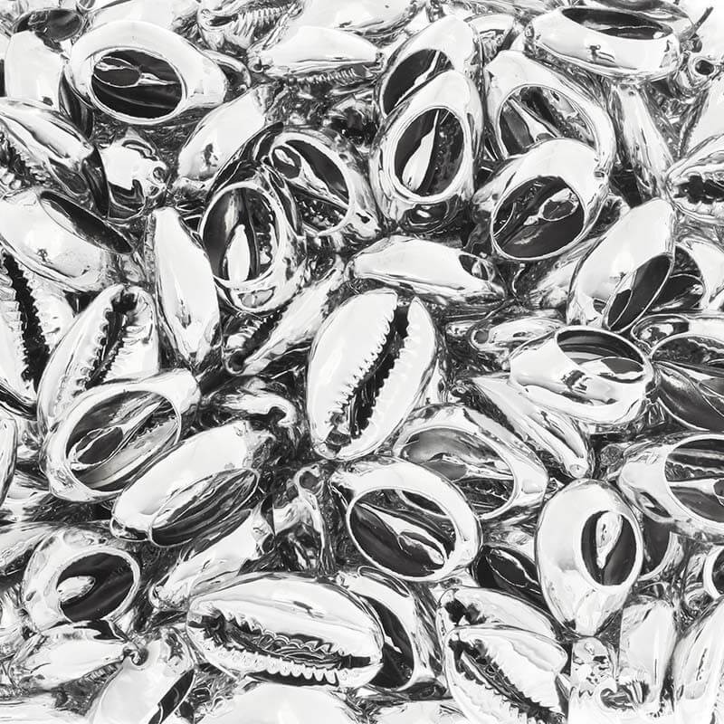 Muszelki Kauri cięte platerowane srebrne 25-30mm 1szt. MU014