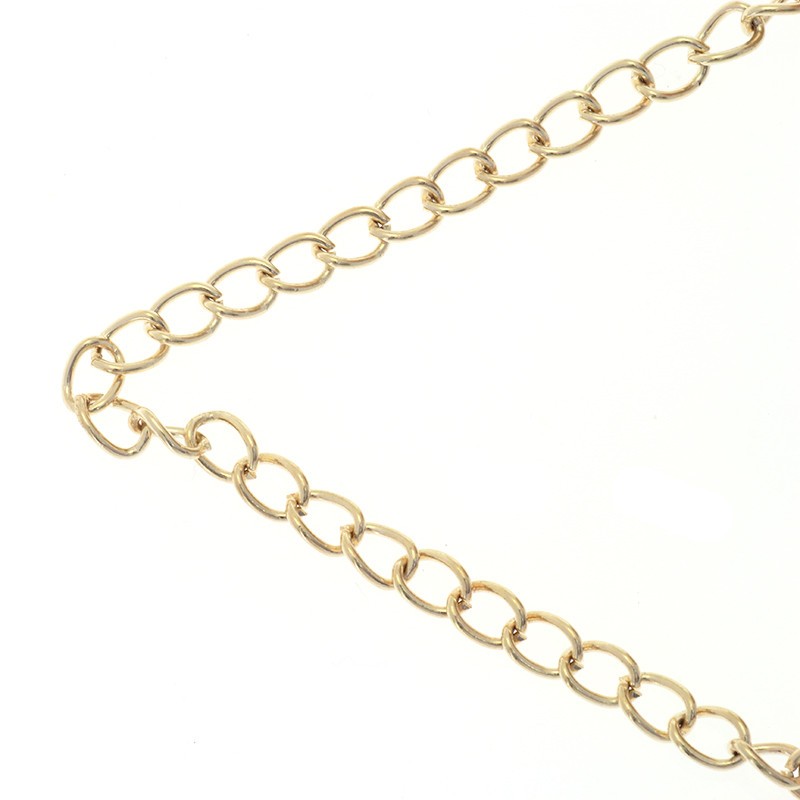 Chains by the meter / oval twist / gold 7x5mm 1m LL178KG