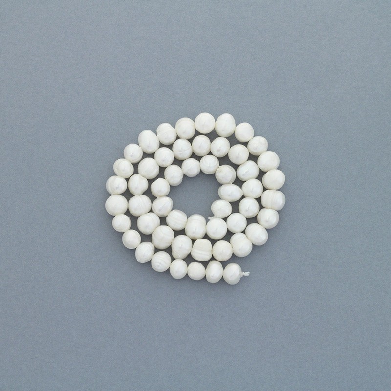 Freshwater pearls / white rope 53pcs / 7-8mm oval ribbed PASW175