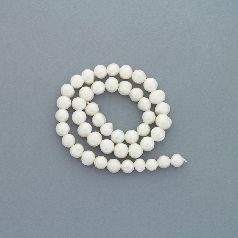 Freshwater pearls / white rope 46pcs / oval ribbed / 8-9mm PASW177