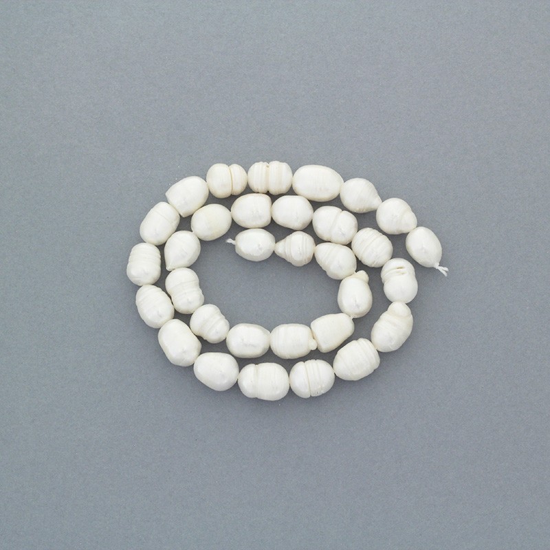 Freshwater pearls / white rope 26pcs / oval ribbed / 9-10mm PASW185