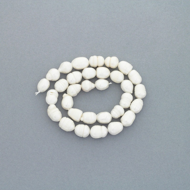 Freshwater pearls / white rope 26pcs / oval ribbed / 9-10mm PASW185