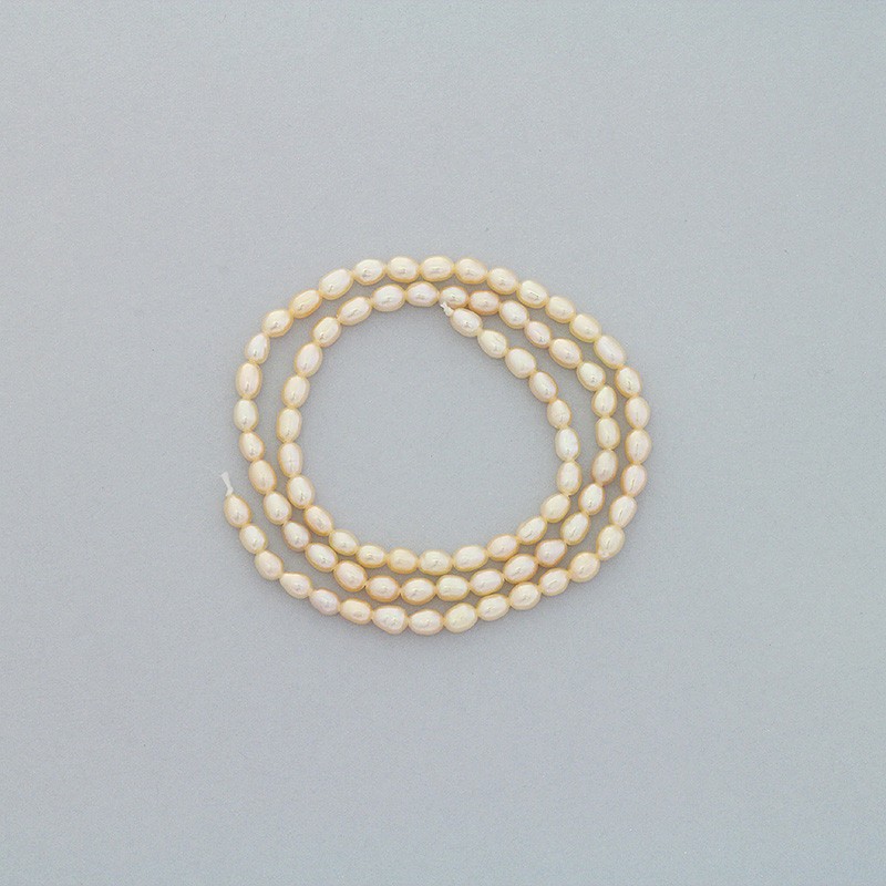 Freshwater pearls / salmon / rope 38cm / oval ribbed / 2.5-3mm PASW134