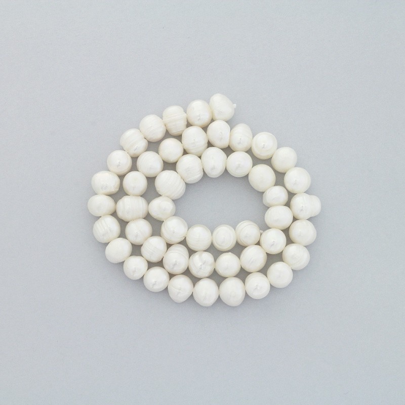 Freshwater pearls / white rope 48pcs / oval / 8-9mm PASW146