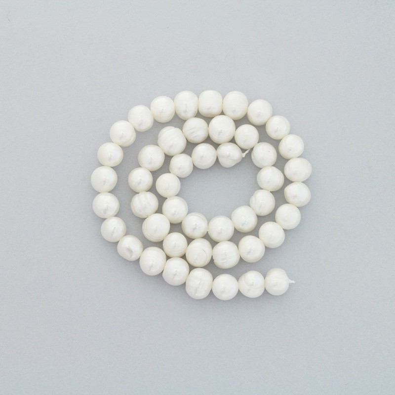 Freshwater pearls / white rope 46pcs / oval / 8-9mm PASW149
