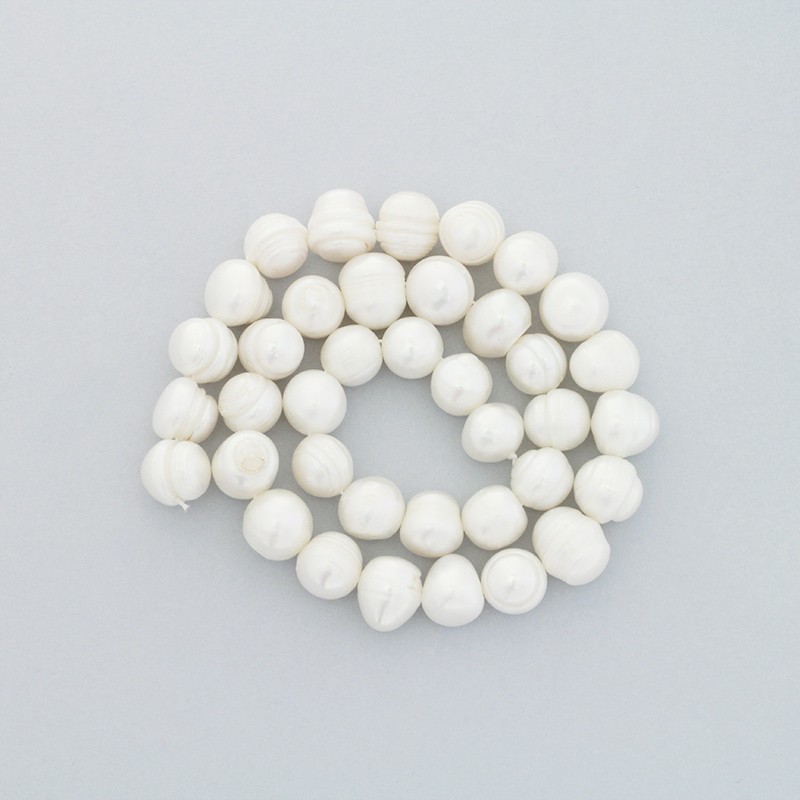 Freshwater pearls / white rope 38pcs / oval / 10-11mm PASW150