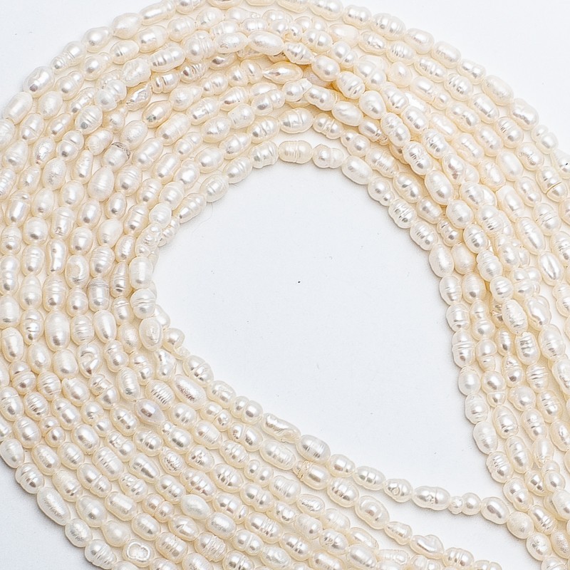 Freshwater pearls / string 36cm / oval ribbed / 3-4mm PASW194