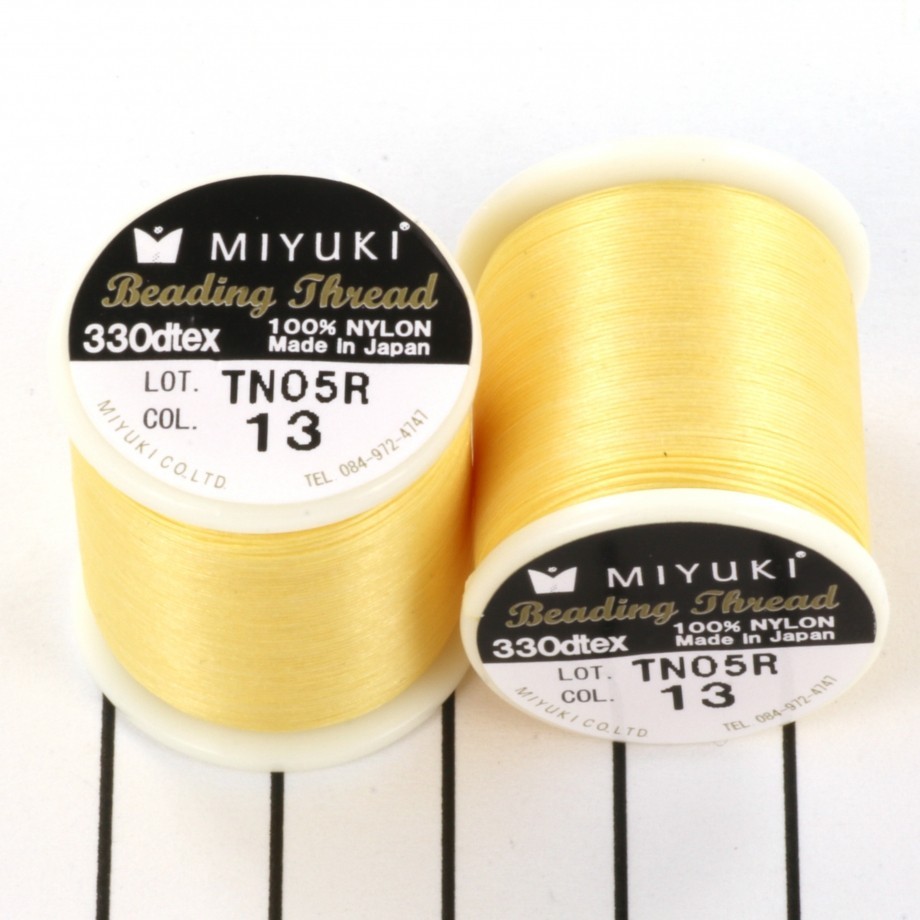 Threads Miyuki / yellow / nylon / spool 50m NCMI13