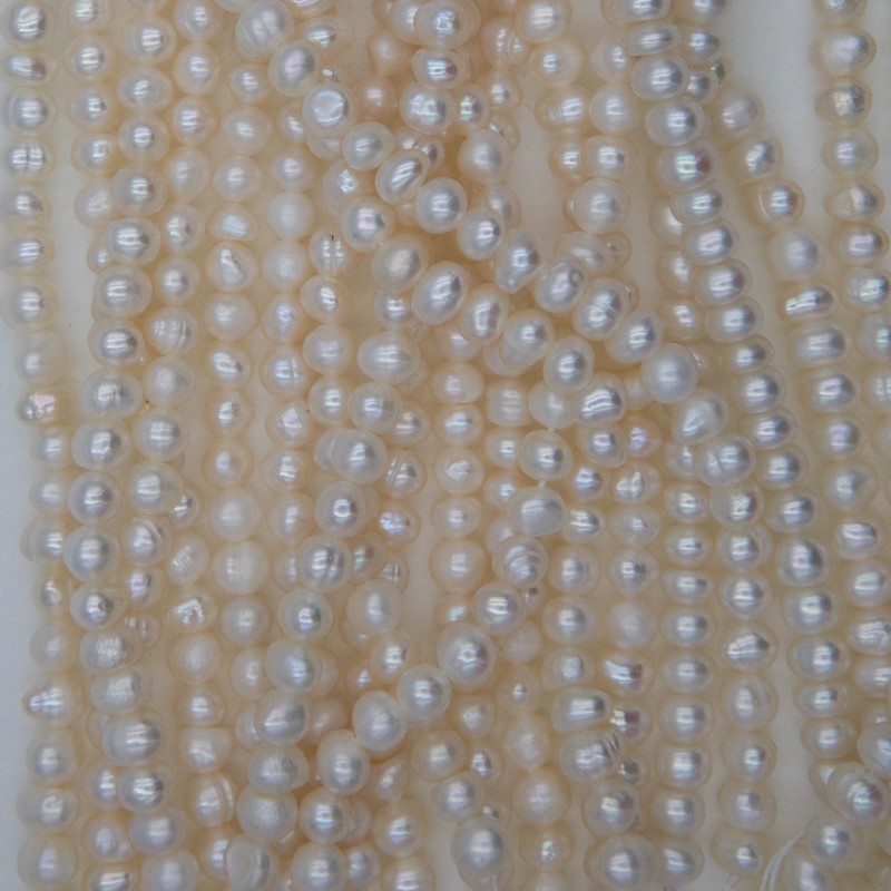 Natural pearls / rope 34cm / oval / 4-5mm PASW262