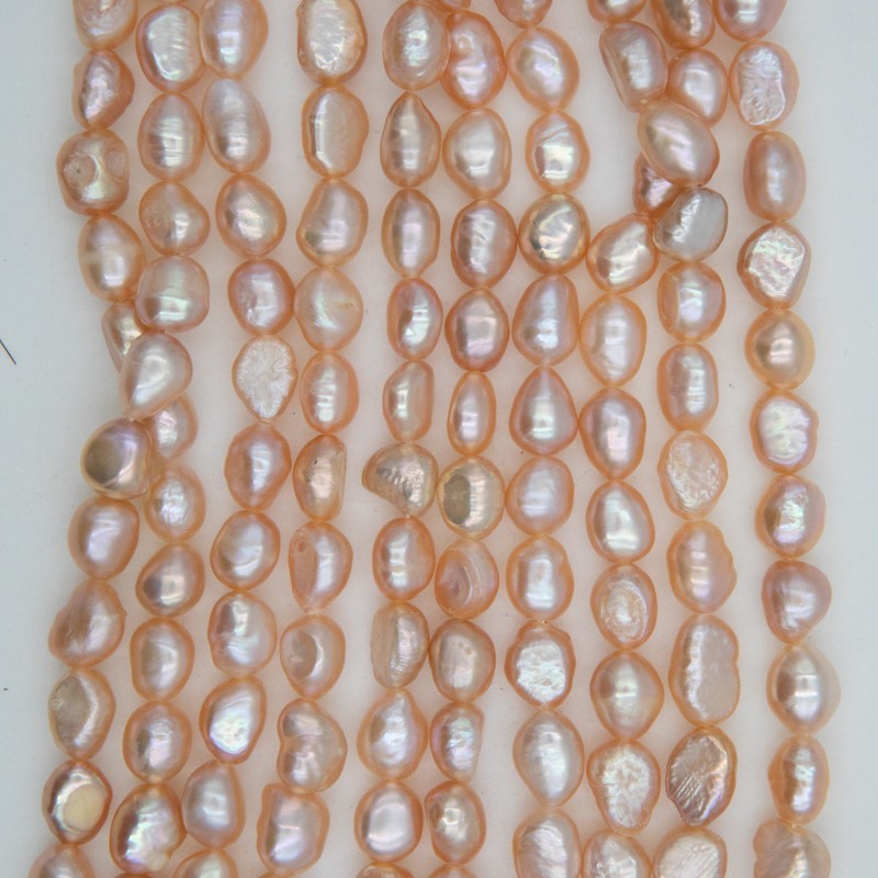 Dyed pearls / peach / rope 35cm / irregular oval / 7-8mm PASW284