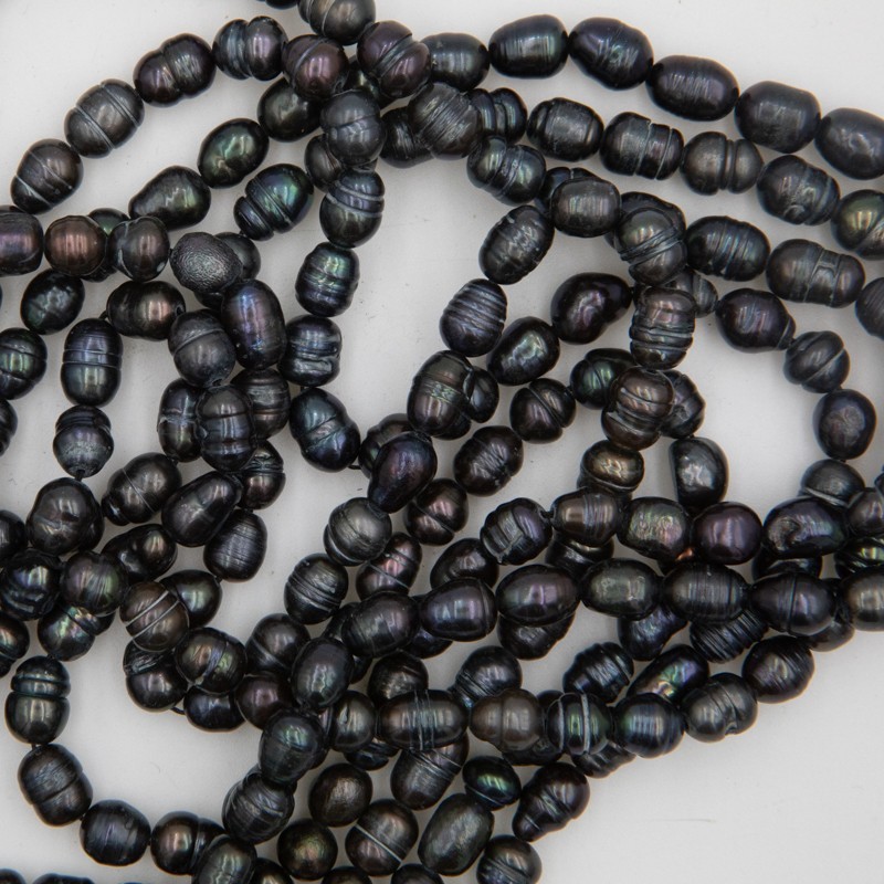 Freshwater pearls / black / oval ribbed / rope 35cm / 6-7mm PASW265
