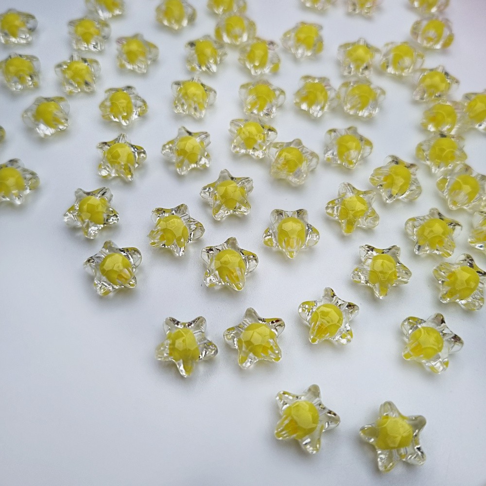 Koraliki akrylowe/ kryształkowe gwiazdki/ żółty ok.11mm/ 10szt. XYPLKSZ072