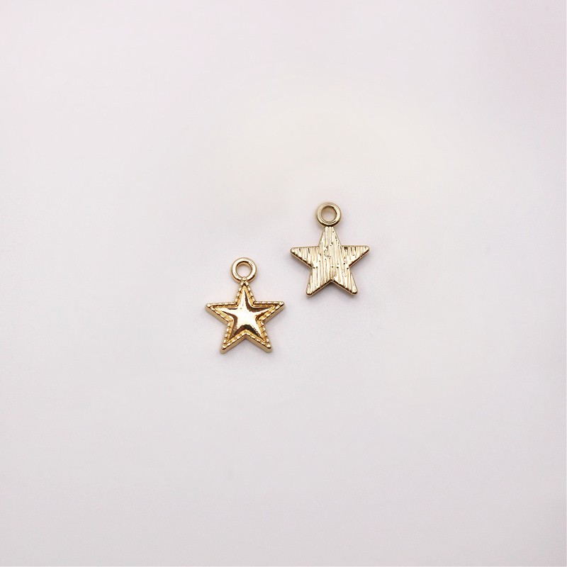 Pendant/decorated star/gold 15x12.5mm 1pc AKG939