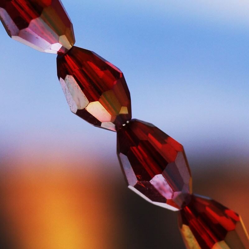 Twisted olive faceted glass red AB 9x6mm 4pcs SZSZOL0804